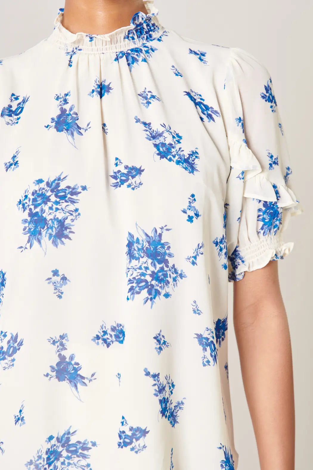 White and Blue Floral Smocked Mock Neck Blouse
