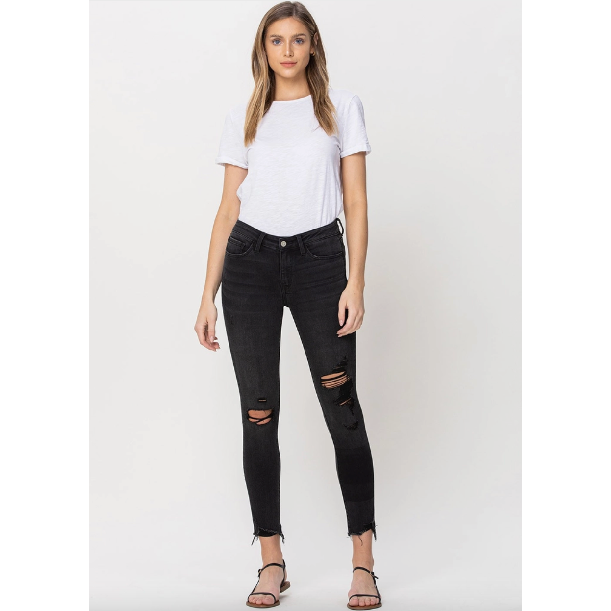Mid Rise Distressed Raw Hem Crop Skinny Jeans
