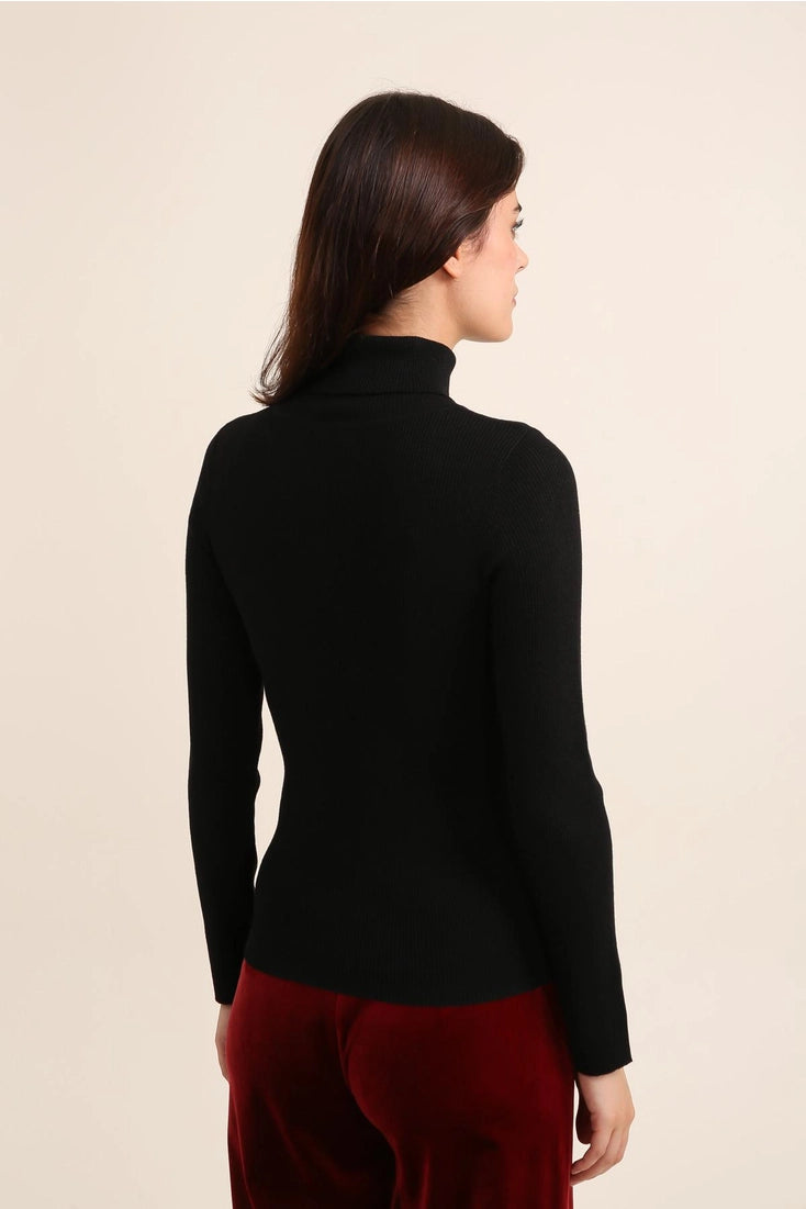Wool Turtleneck Ribbed Sweater In Black